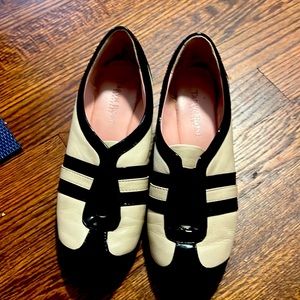 Pretty and stylish black and beige wedges. Gently worn.